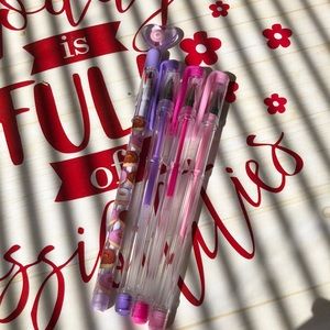 Purple and pink set of pens plus three free pencils